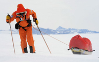 Polar training dragging sleds on skis