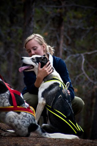Walker and husky on a farm trail