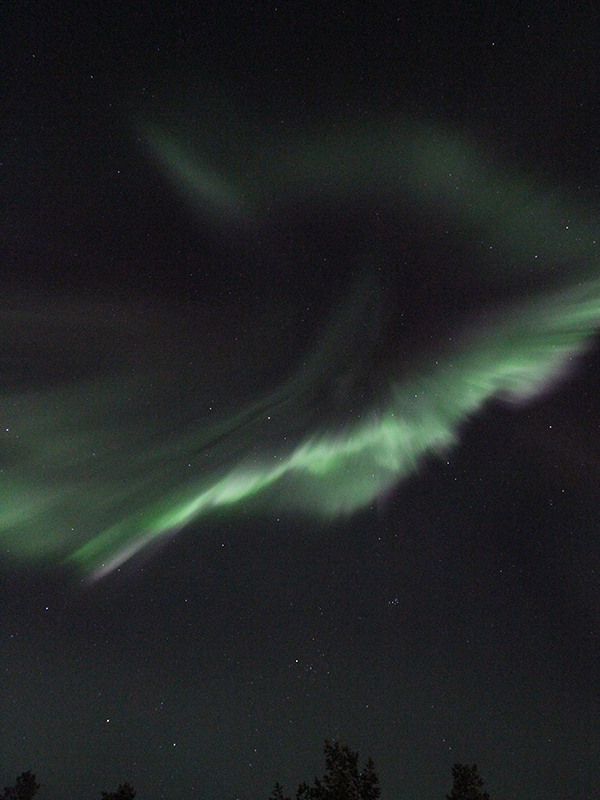 Burst of northern lights over the arctic sky