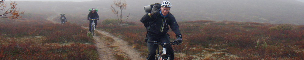 Mountain biker on a downhill trail in the Lappish fells